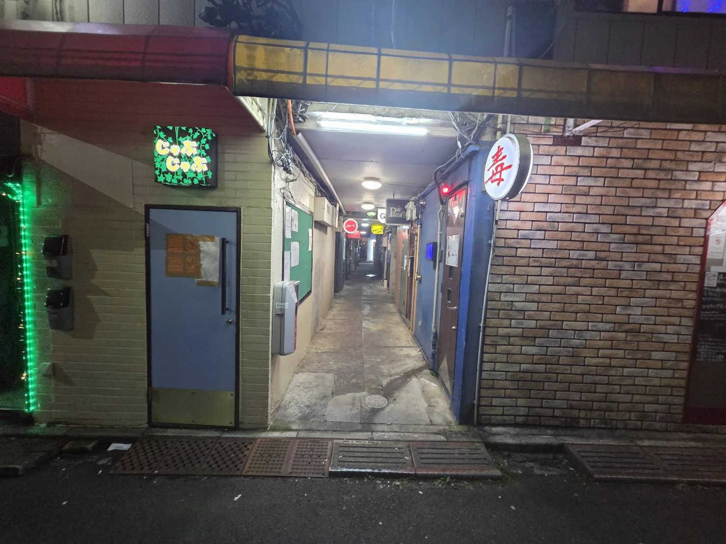 Older building in Shinjuku 2-chome at night; the area was home to one of Tokyo's postwar red-line districts