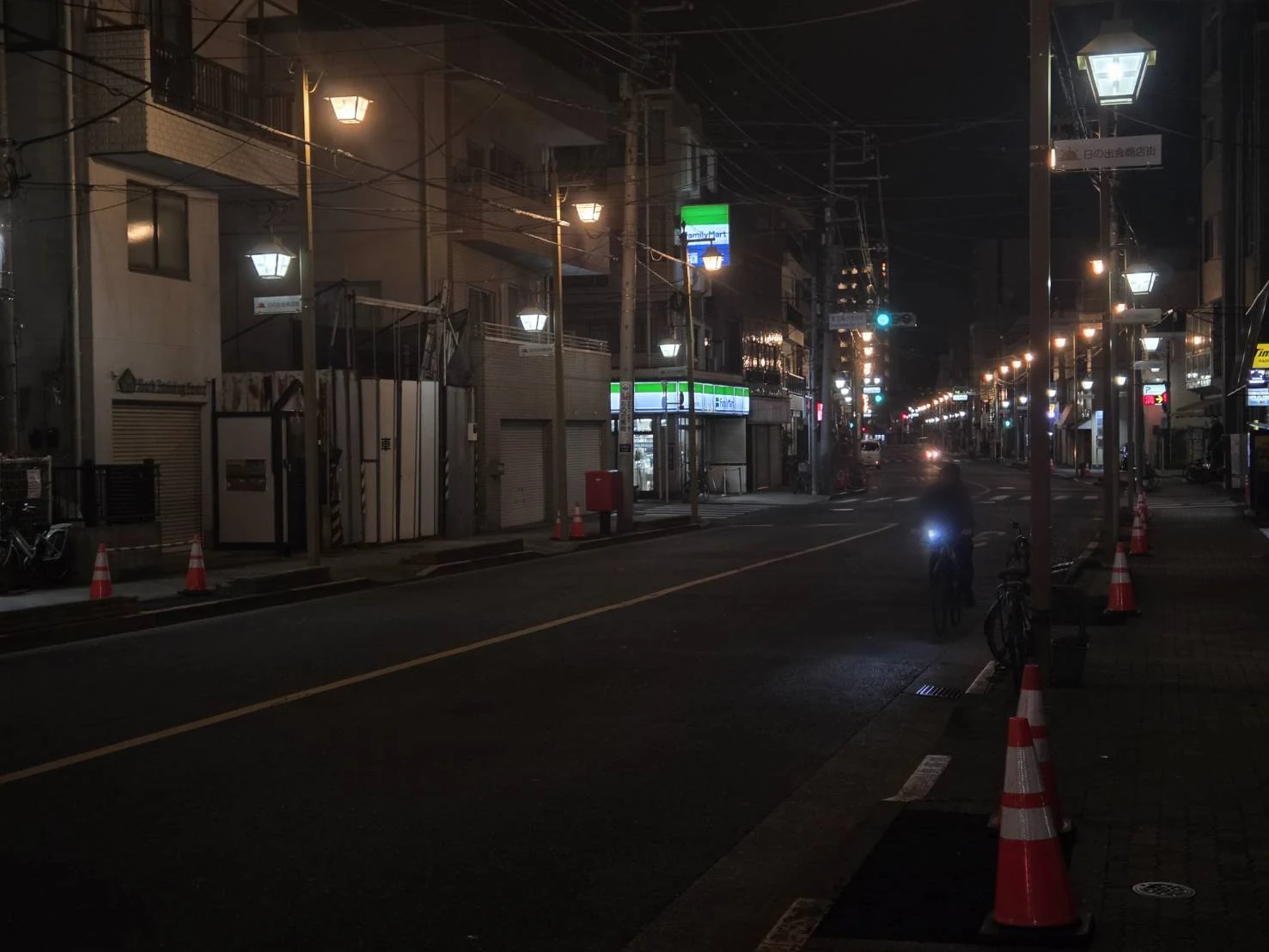 Streetlamps along a road beside the former Yoshiwara quarter at night